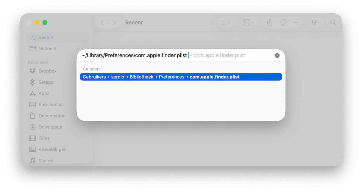 Kopieer en plak het volgende bestandspad: ~/Library/Preferences/com.apple.finder.plist